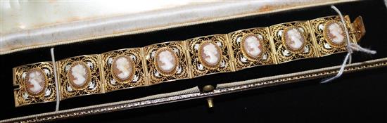 An Italian parcel gilt silver filigree and cameo bracelet, 7in.